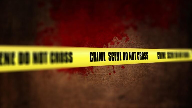 3d-render-crime-scene-tape-against-defocussed-background.jpg