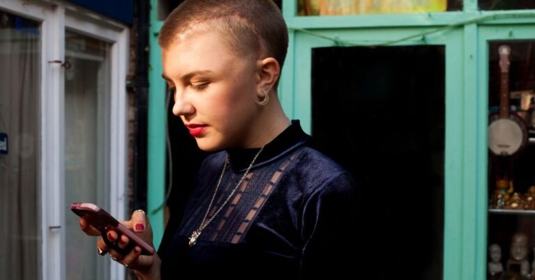 GRT-Female-Phone-Serious-1200x628-Facebook.jpg