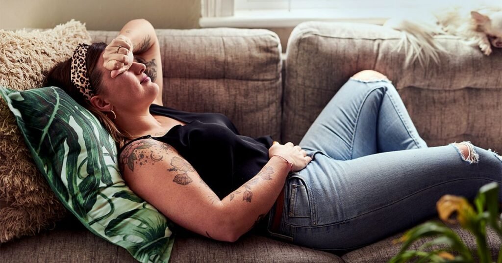 GRT-female-laying-on-couch-sick-1200x628-facebook.jpg