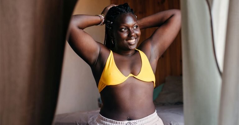 GRT-female-looking-in-mirror-smiling-1200x628-facebook-1.jpg