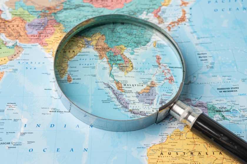 asia-magnifying-glass-close-up-with-colorful-world-map-1.jpg