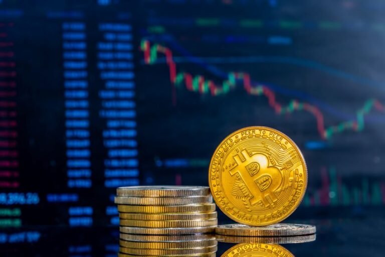 closeup-golden-bitcoins-dark-reflective-surface-histogram-decreasing-crypto-1.jpg