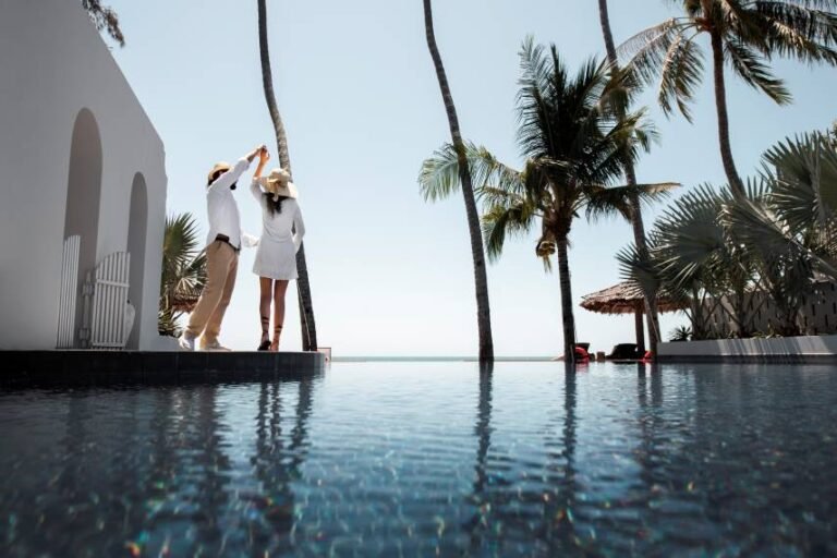 couple-dancing-by-pool-vacation-1.jpg