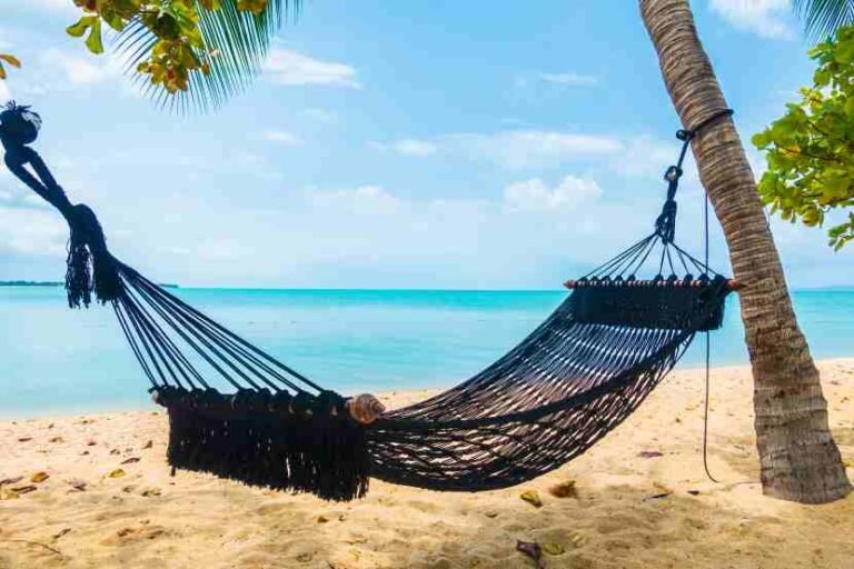 empty-hammock-swing-around-beach-sea-ocean-with-white-cloud-blue-sky-travel-vacation-1.jpg