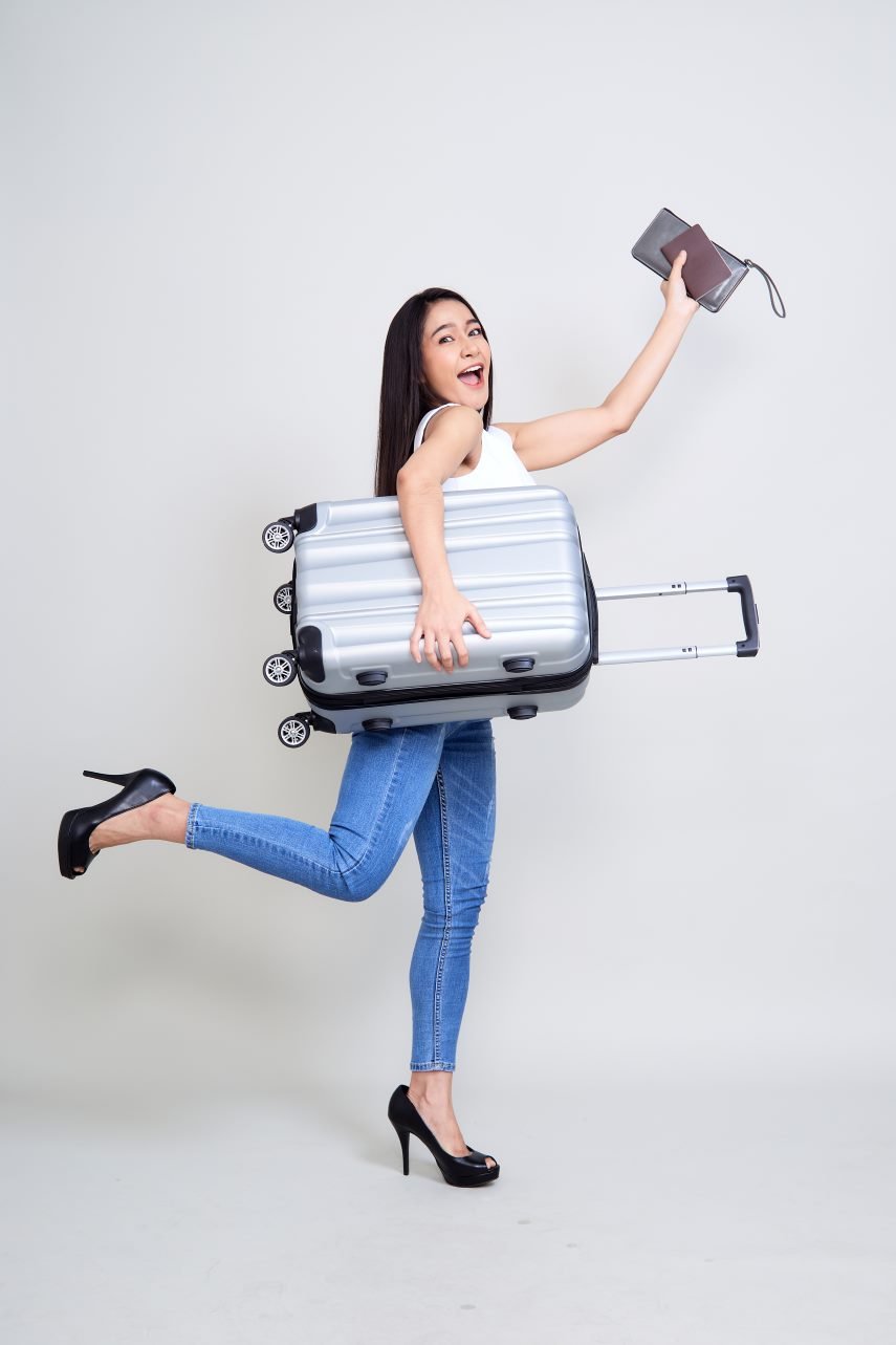 happy-young-asian-woman-travel-1.jpg