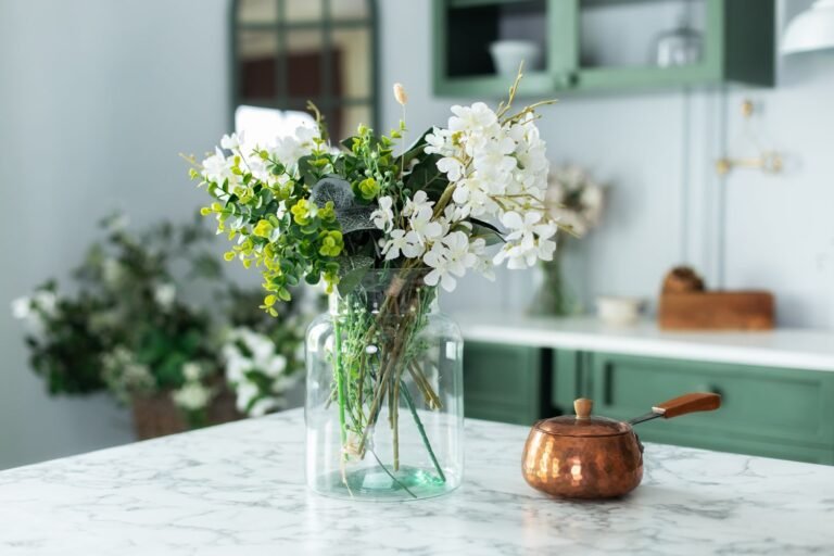 home-upgrades-kitchen-flowers-GettyImages-1402825458-b9becd3051fa4b43b6b15d244e982e0b.jpg