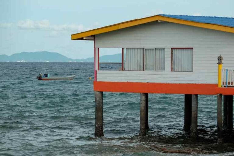 stilt-house-sea-against-sky-1.jpg
