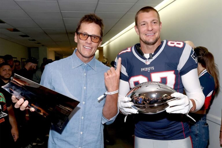 tom-brady-rob-gronkowski-lombardy-trophy-062025-c2f43c0d96c041cf97980b1606cad167.jpg
