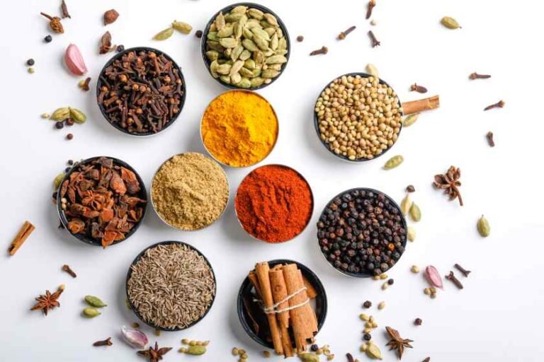 various-spices-bowls-white-top-view-with-copy-space-1.jpg